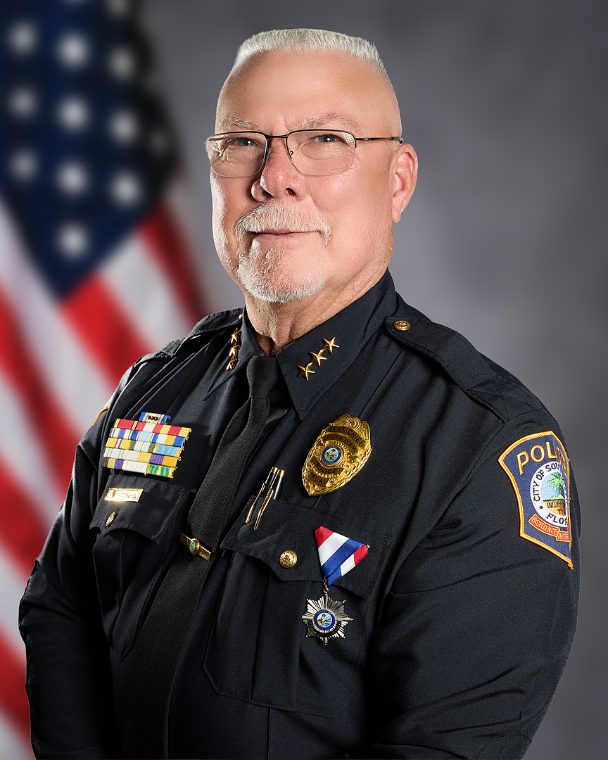 Asst-Chief-L-Corbin_1089_FlagBG.jpg